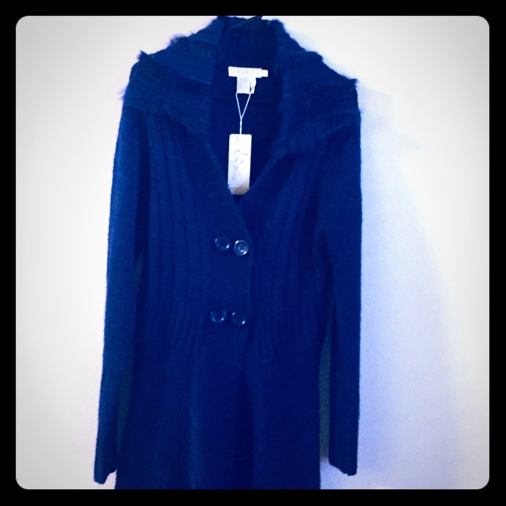 Sweater with feathered accent in collar.